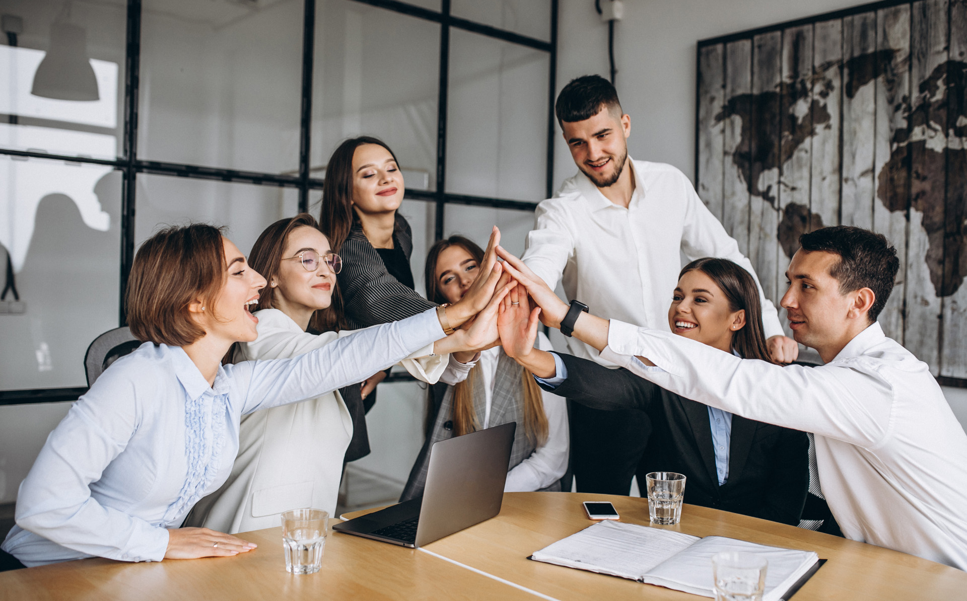 Group of people working out business plan in an office
